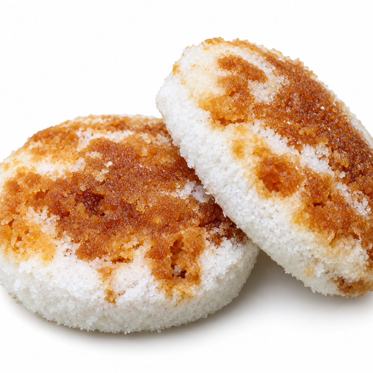 Two traditional Bengali Bhapa Pitha with coconut and date molasses filling
